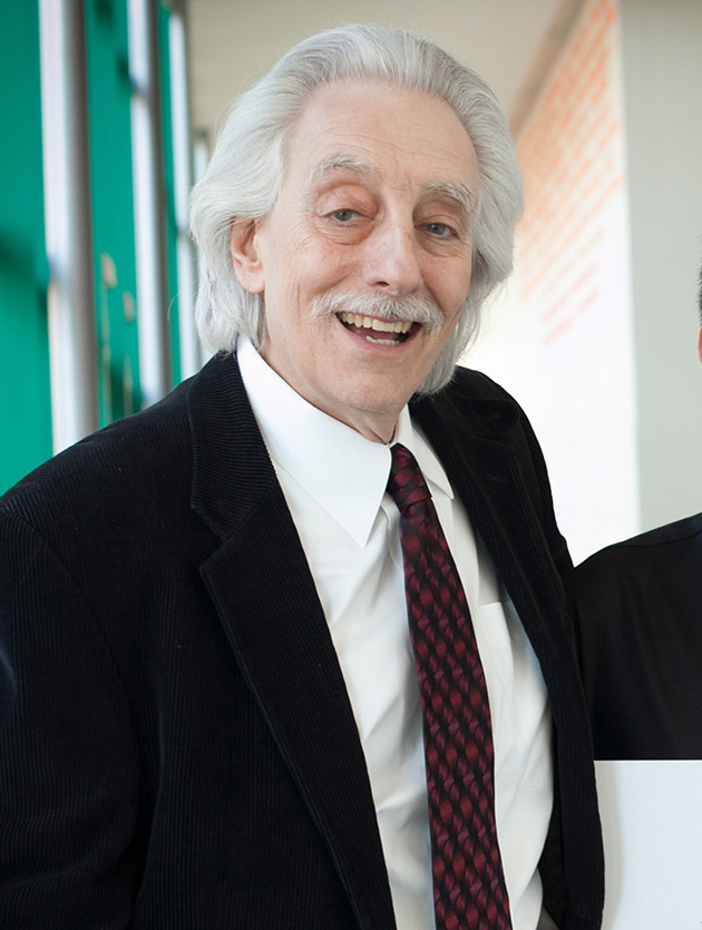 Danny Bernstein '14, a composer, playwright, pianist, musical director and actor, and the 2014 Cornell Council for the Arts (CCA) Undergraduate Artist of the Year (with certificate), with his advisor Bruce Levitt (left) professor of performing and media arts (PMA).