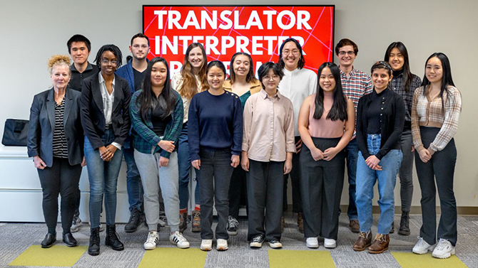 Members of the Cornell Translator-Interpreter Program pose for a portrait in Kennedy Hall.