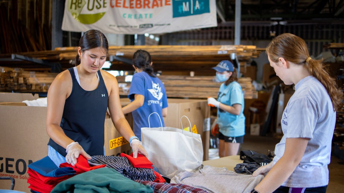 Incoming students worked at the ReUse Center during the Pre-Orientation Service Trips program. Chris Kitchen.