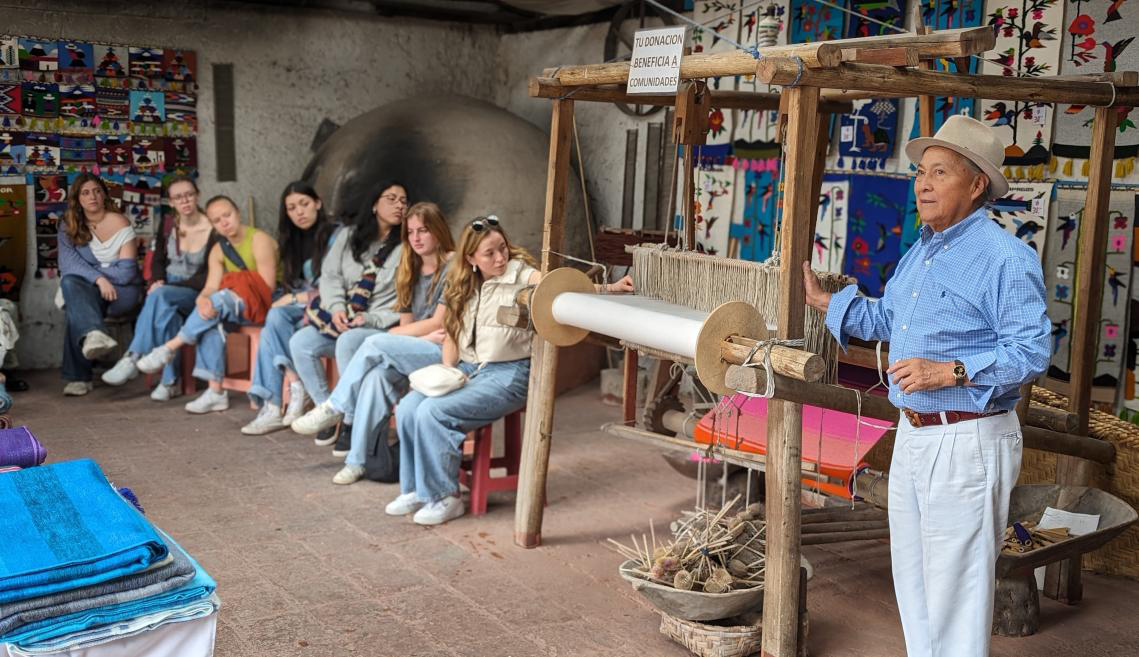 Students visit Peguche Wasi to learn about how indigenous peoples are preserving traditional hand-weaving practices.