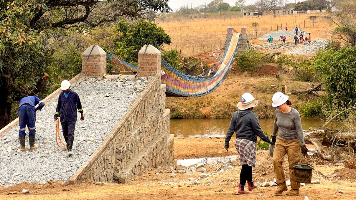 With the community, the 2024 Engineers in Action project team built a bridge over the Black Mbuluzi River in Eswatini - connecting 5,400 people to schools, health care and markets.