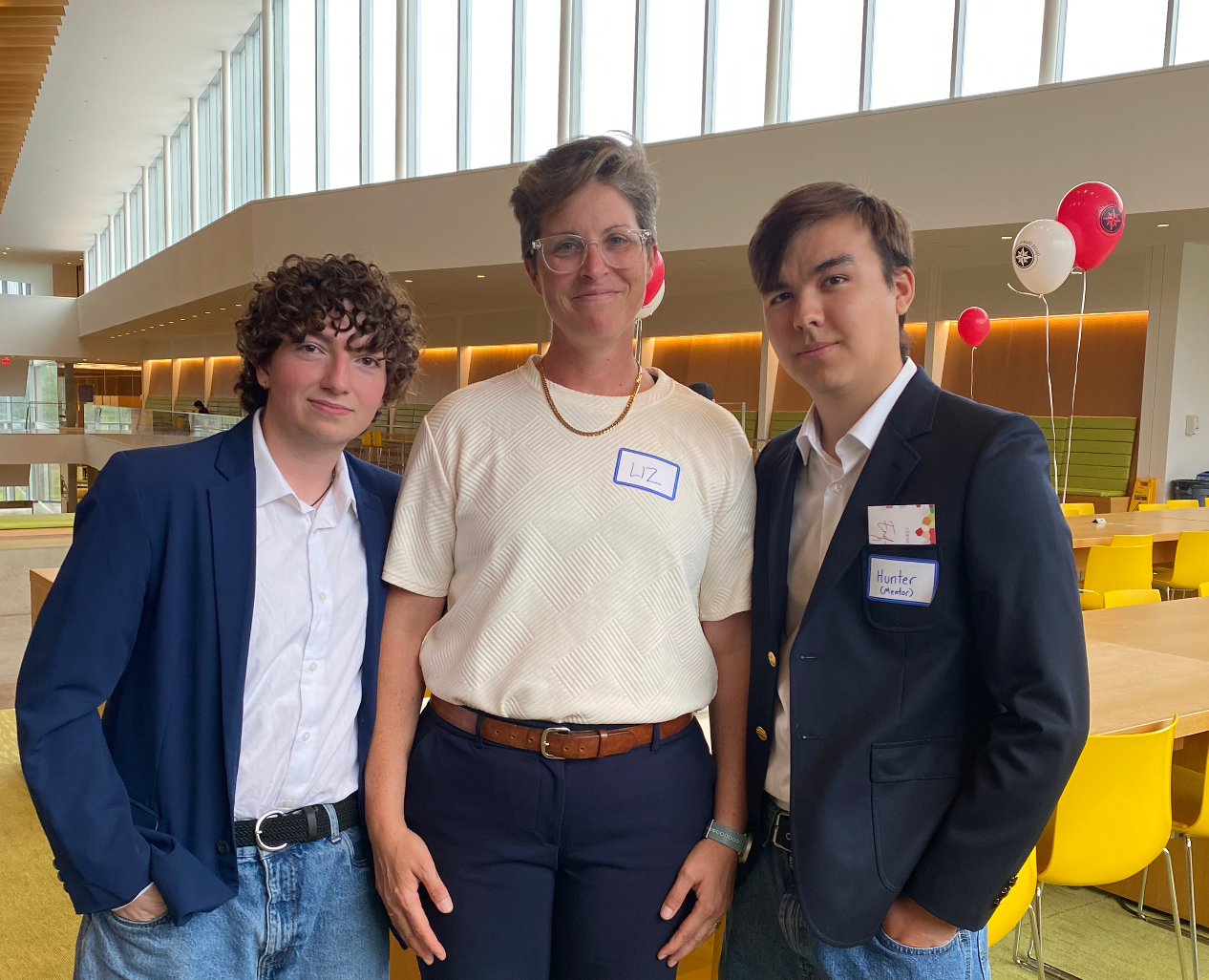 (L to R) Jules Iwasko '26, Liz Millhollen, Hunter Leach III '25, Cornell ’25 during Upward Bound's end-of-summer celebration in 2024.