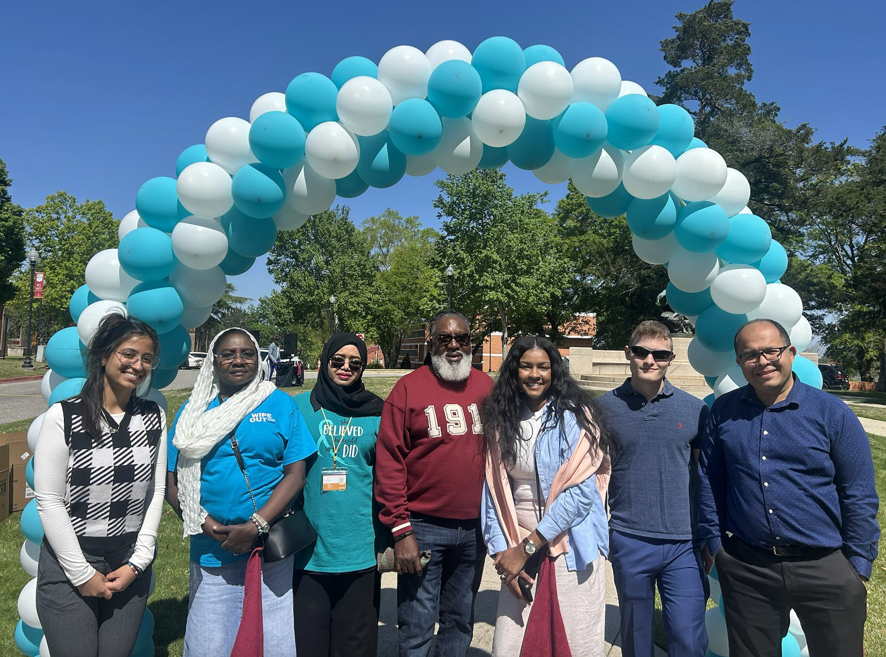 (l to r): Eliz Celik '25; Ehsan Abdalla, assistant professor of public health, director of analytics, Tuskegee University; Isra Elhussin, assistant professor of biology, Tuskegee University; Dr. James Harris; Jo Shuford-Guice, NP; Christopher Biloski '25; Iman Hassani, assistant professor of chemical engineering, Tuskegee University, during a Cervical Cancer Campaign in concert with a HPV Vaccination Inaugural Walk event held at Tuskegee University in April 2025. Photo/provided