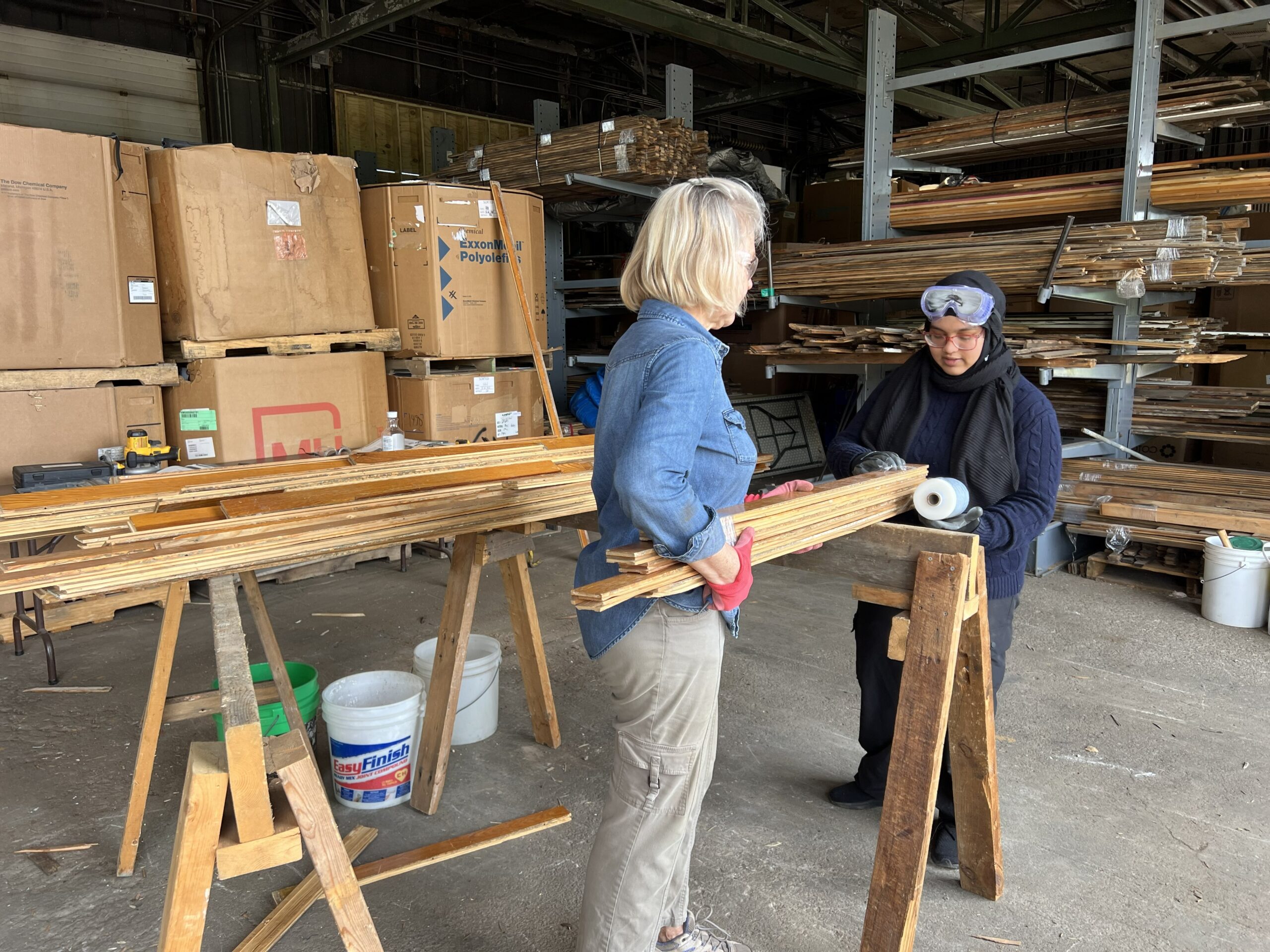 Galiba Anjum '26 and Gretchen Worth, M.P.S. ’20, M.A. ’20, take time away from the office to work with materials at Finger Lakes ReUse. photo/provided
